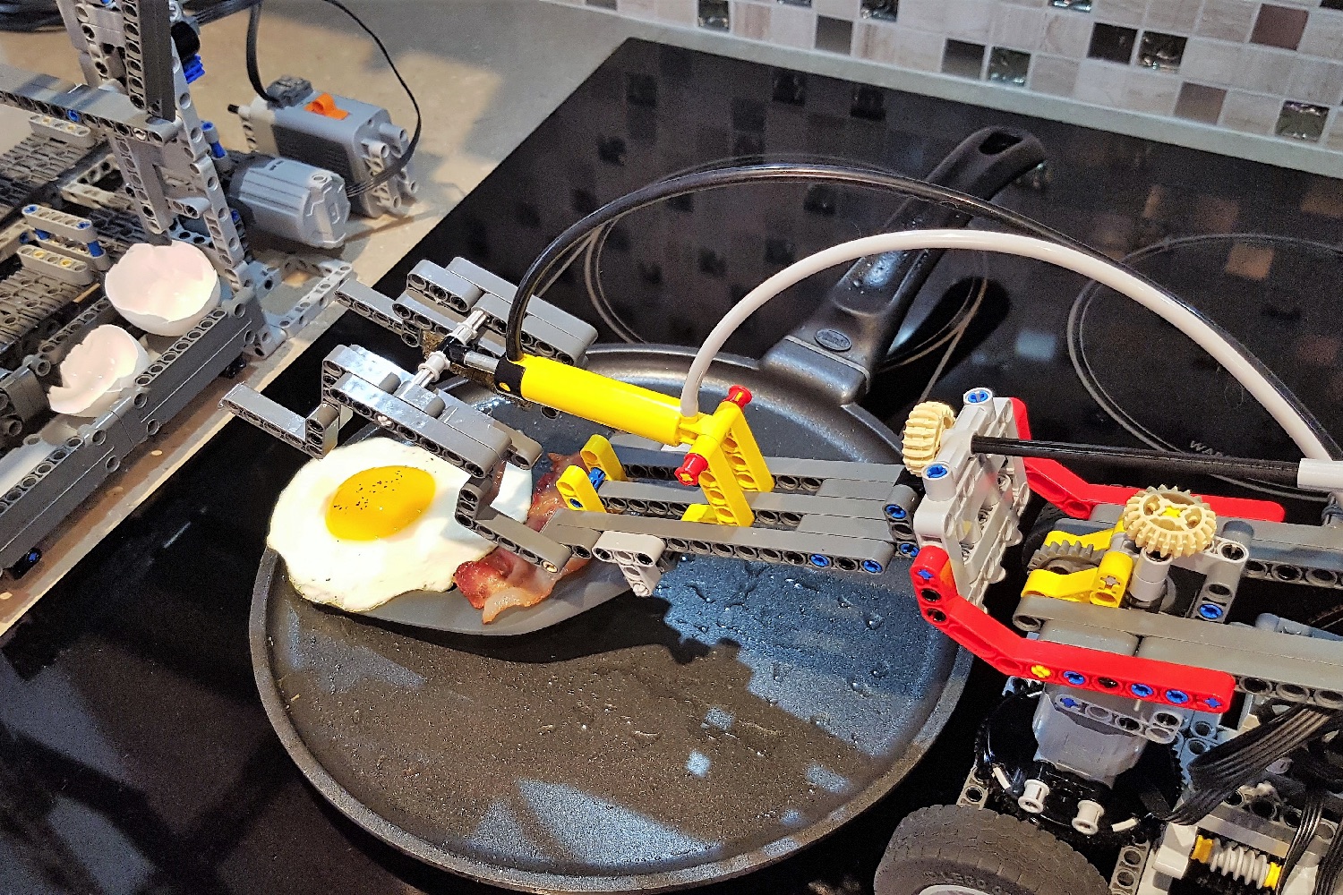 lego robot prepares breakfast grabber2