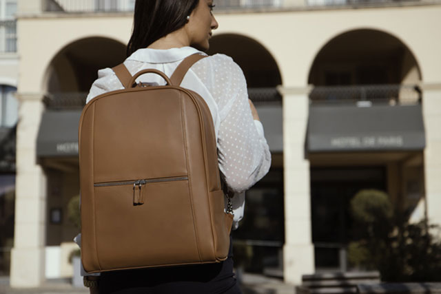 A Noreve Urban Backpack being worn by a woman.
