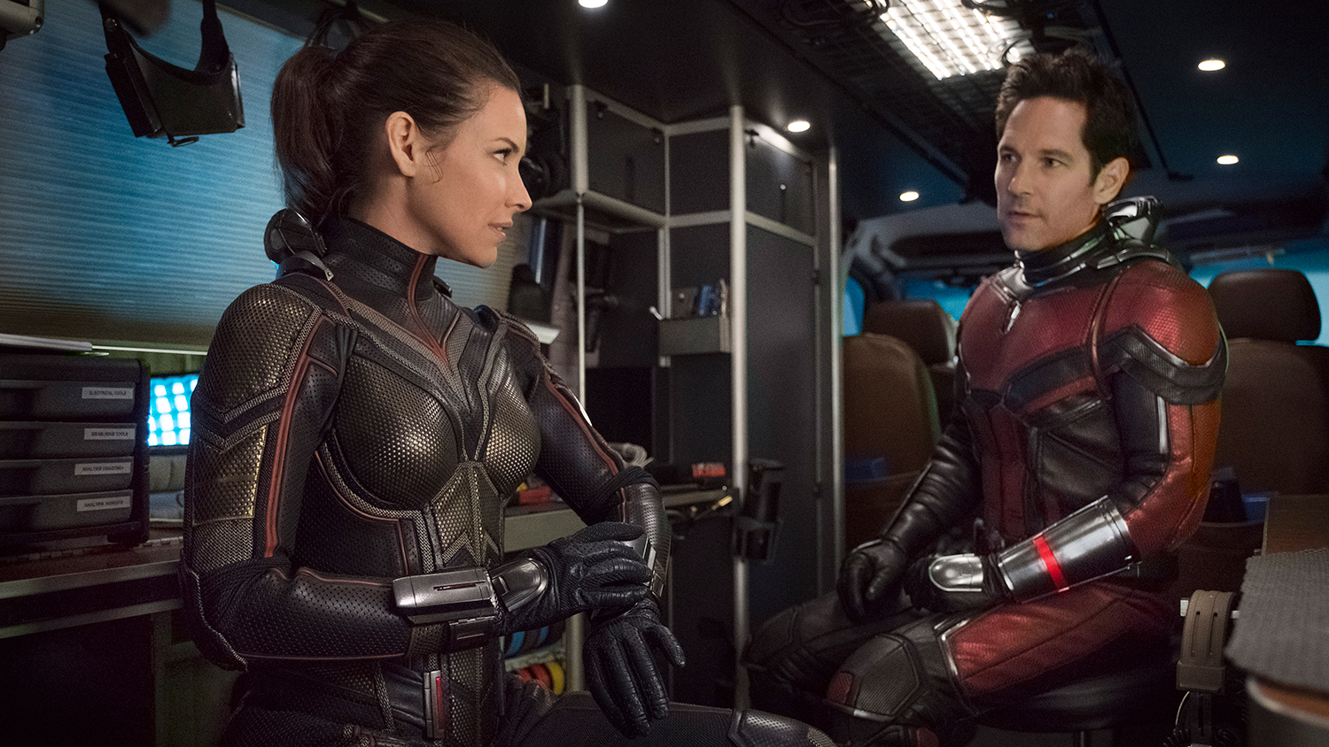 Evageline Lilly and Paul Rudd as The Wasp and Ant-Man talking inside a van in Ant-Man and the Wasp.
