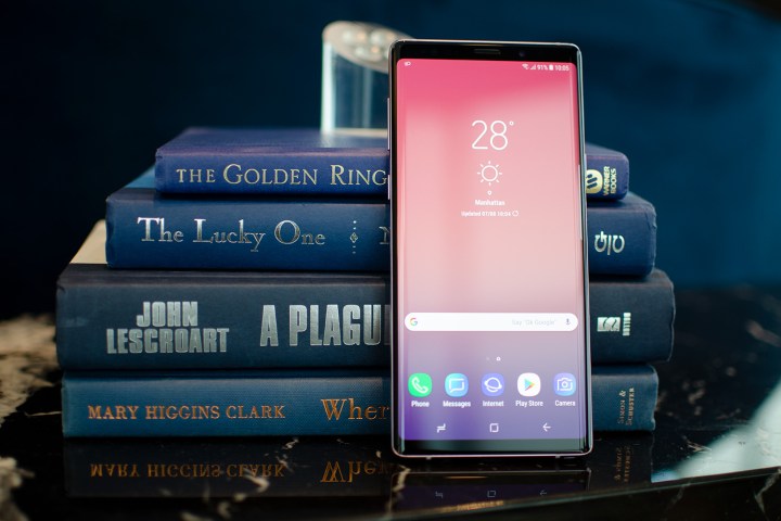 Galaxy Note 9 front against books