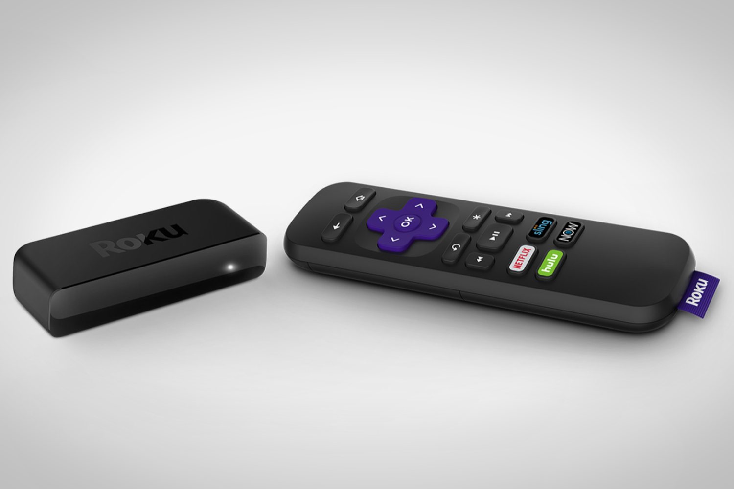 The Roku Premiere 4K streaming stick with its remote.