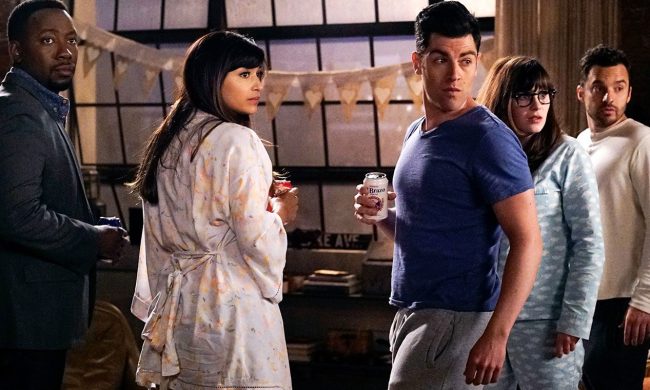 Five people look and stares in a scene from New Girl.