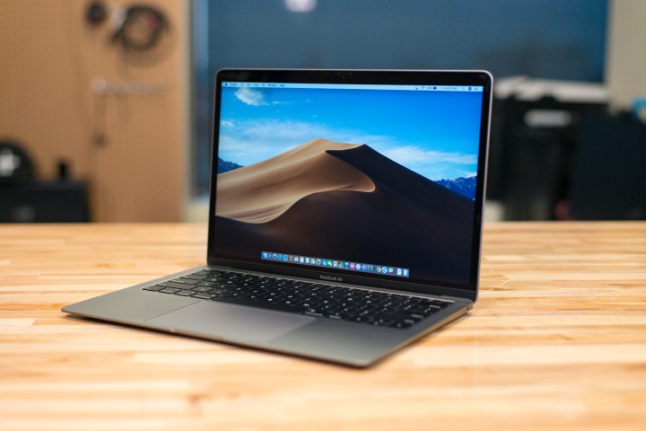 MacBook Air on a desktop displaying the desktop screen.