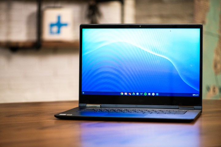 Chromebook sat on a desk, open on the desktop.