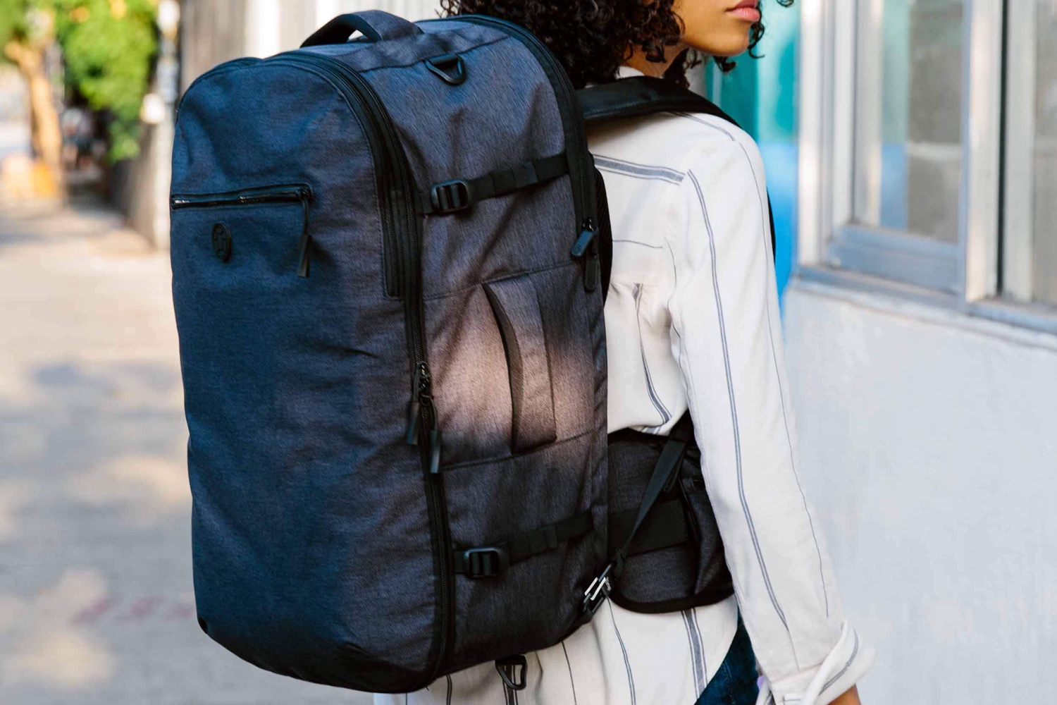 The Tortuga Setout backpack worn by a woman.