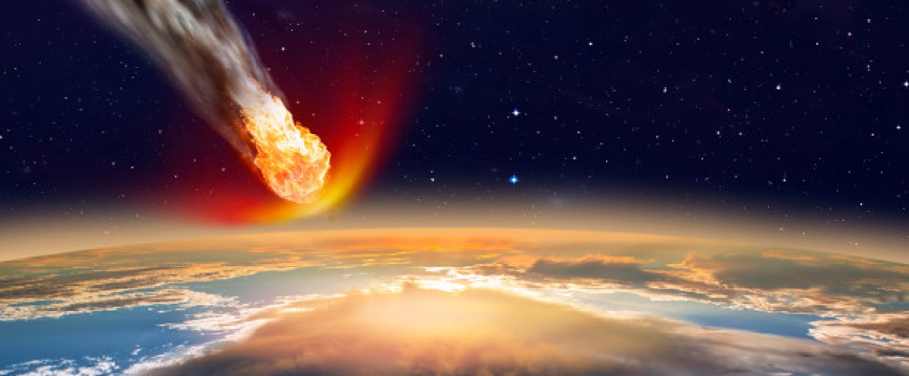 an artists depiction of an asteroid heading toward earth