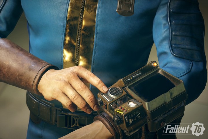A vault dweller playing with their pip-boy.