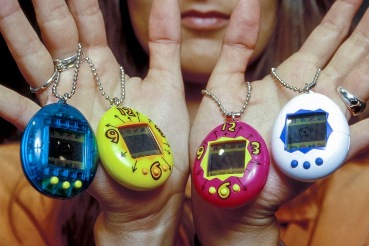 A woman showing off Tamagotchis to the camera | How Tamagotchi shaped technology
