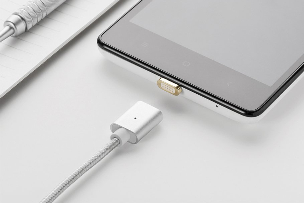 NetDot Magnetic Charging Cable being plugged into a smartphone.