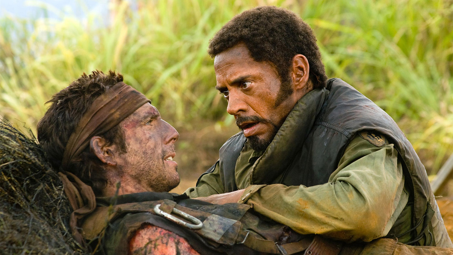 Ben Stiller and Tobert Downey Jr. as Tugg and Kirk shooting a scene in the jungle in the film Tropic Thunder