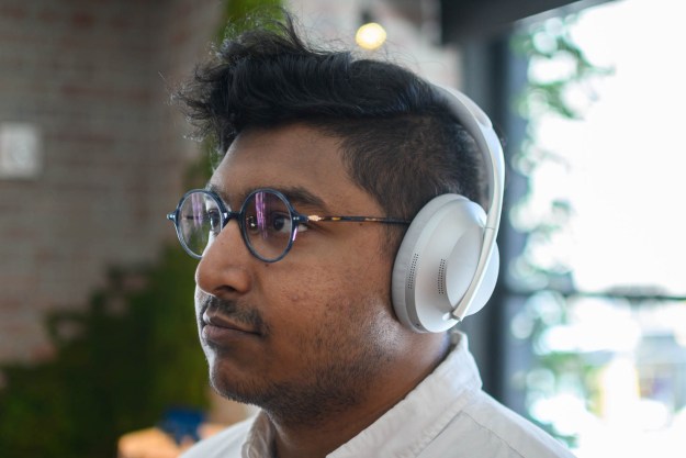 A man wearing the Bose Noise Cancelling Headphones 700.