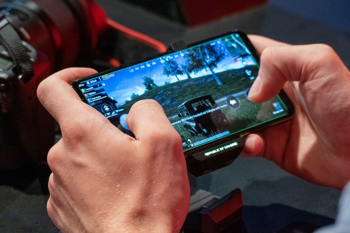The Asus ROG Phone 2 being used for gaming.