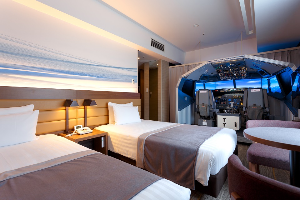 airport hotel builds a full size flight simulator into guest room  1