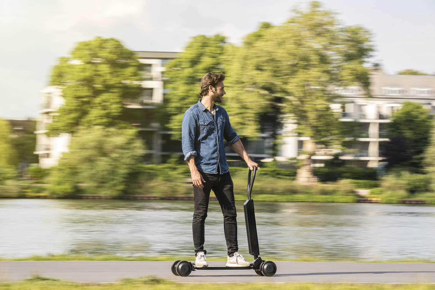 audi shows e tron scooter four wheeled electric skateboard concept combines with