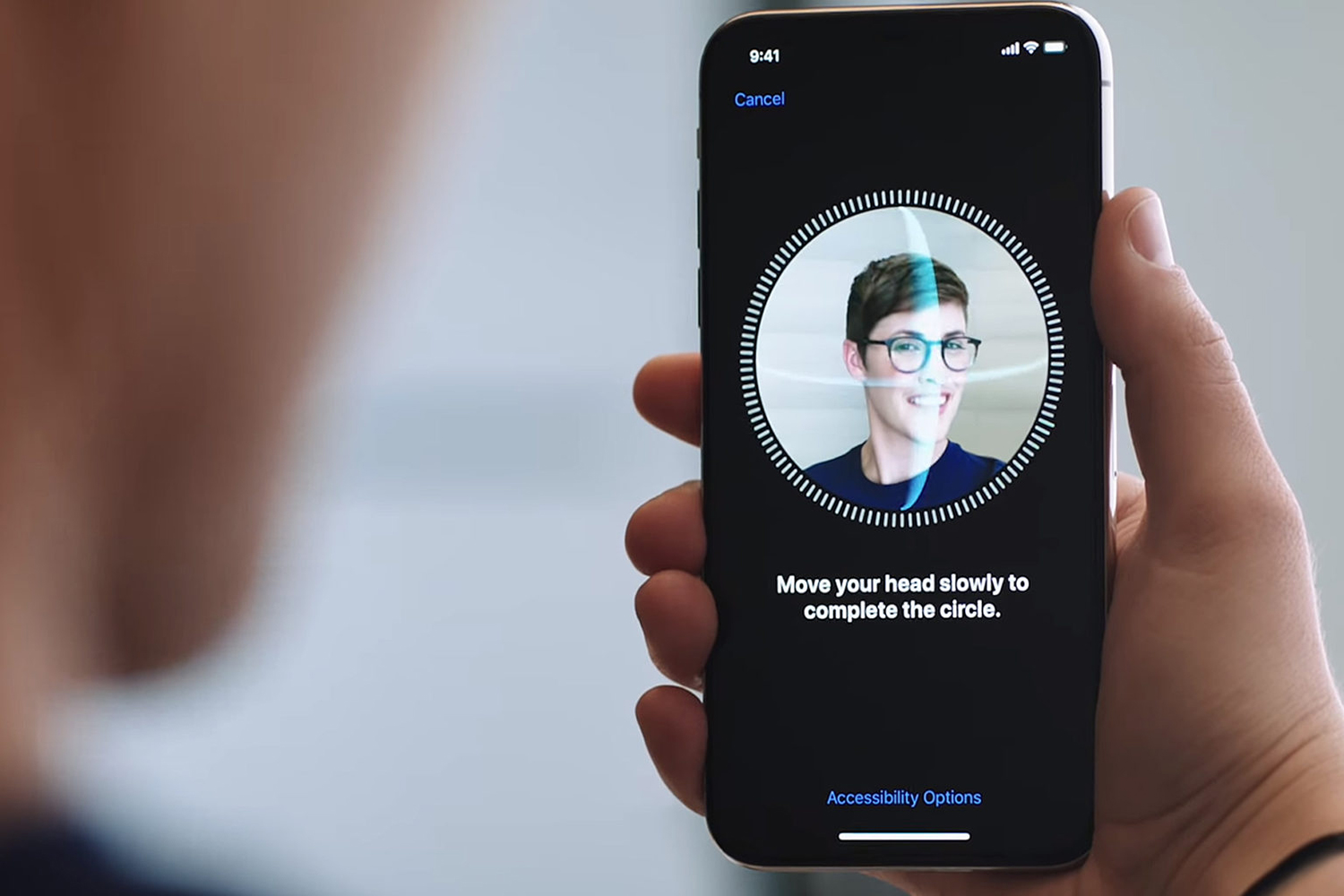 Face ID scanning a face.