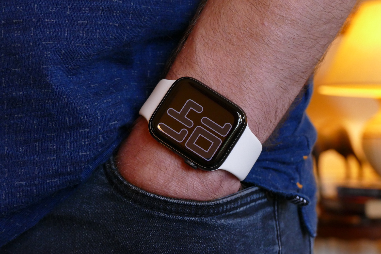 Someone wearing an Apple Watch Series 5 on their wrist.