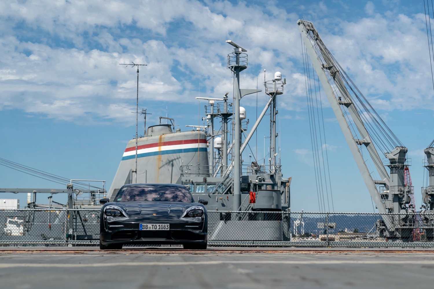 porsche taycan electric car acceleration test on aircraft carrier deck prototype