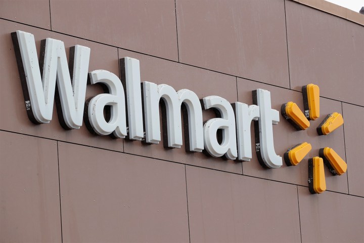 A Walmart sign on the outside of a store.