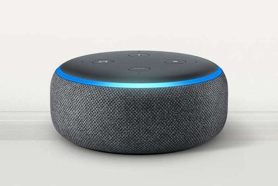 The 3rd-generation Amazon Echo Dot smart speaker with a blue light on top.