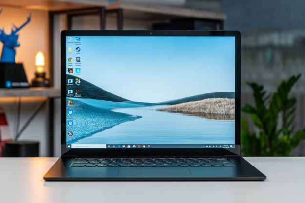 The Microsoft Surface Laptop 3 with a nature scene on the display.
