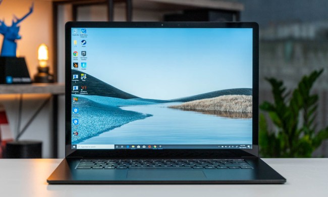 The Microsoft Surface Laptop 3 with a nature scene on the display.
