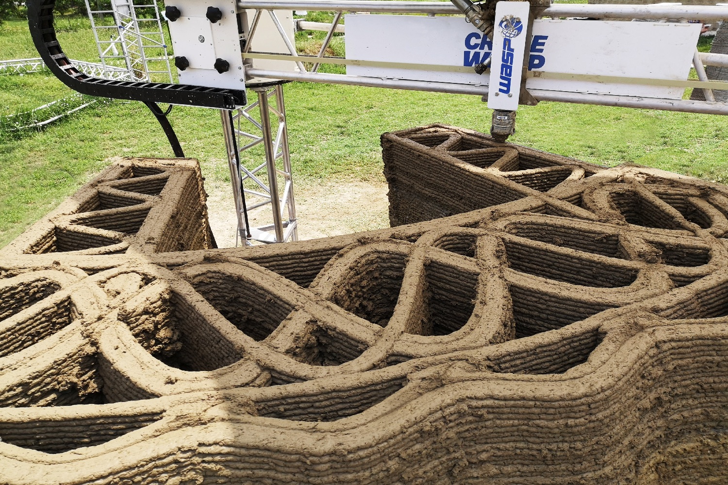 3d printed wasp nest house tecla earth wall section by crane infill