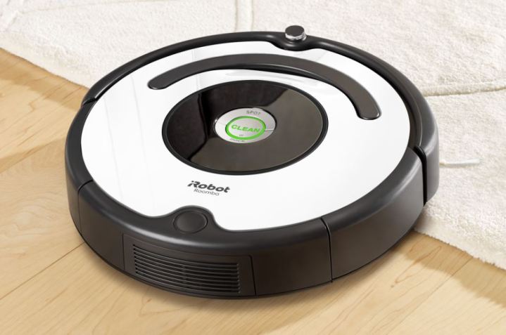 The iRobot Roomba 670 robot vacuum on the floor.