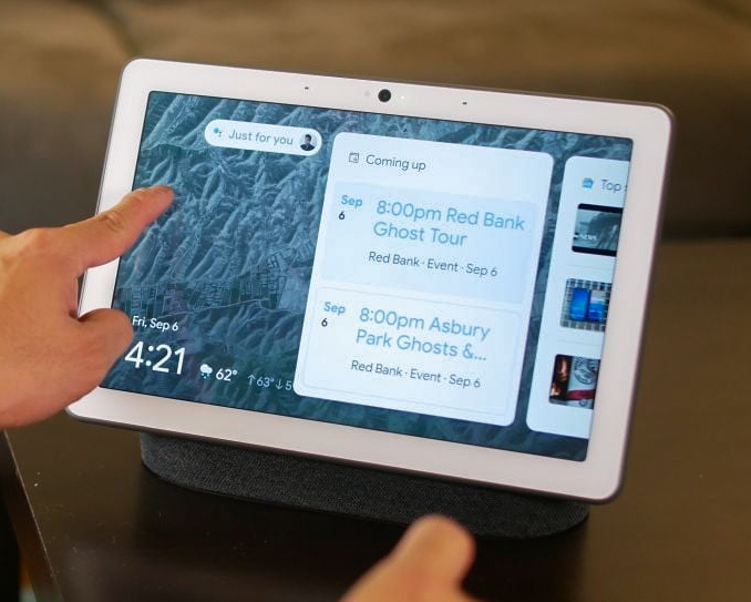 The Google Nest Hub Max in use. 