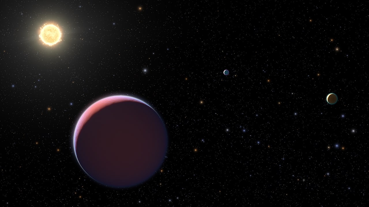 Illustration of star Kepler 51 and three orbiting planets.