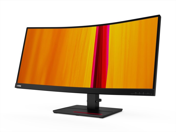 O monitor ultrawide curvo Lenovo ThinkVision T34w-20 com cores abstratas na tela.