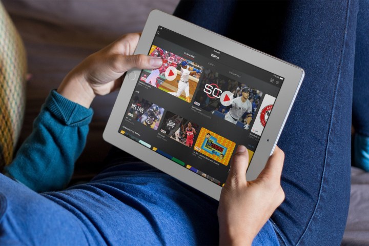 A person browsing the ESPN+ app on an iPad.