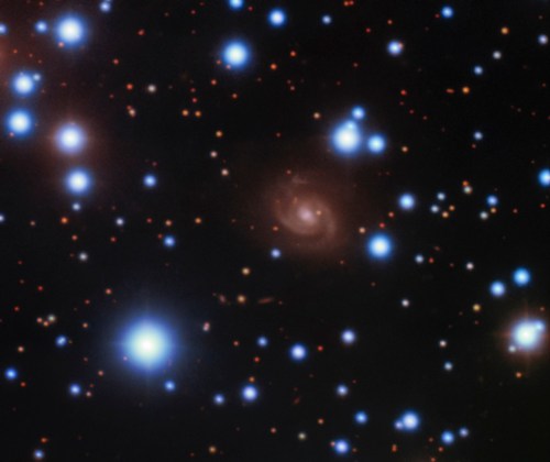 Image of the host galaxy of FRB 180916 (center) acquired with the 8-meter Gemini-North telescope of NSF’s OIR Lab on Hawaii’s Maunakea.