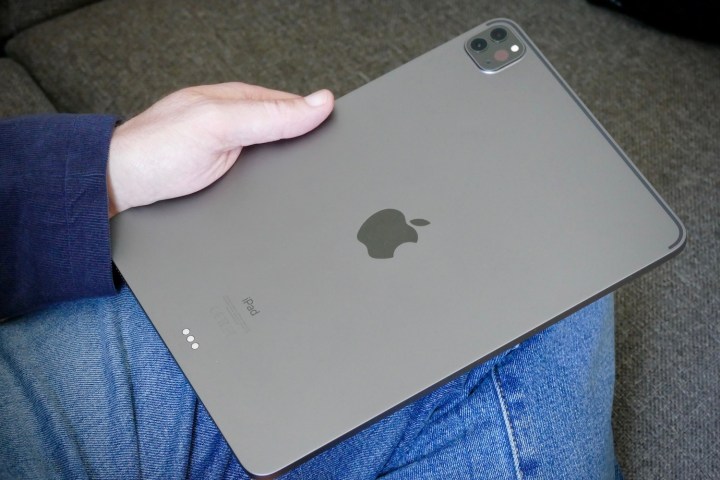 A person holding the iPad Pro 2020.