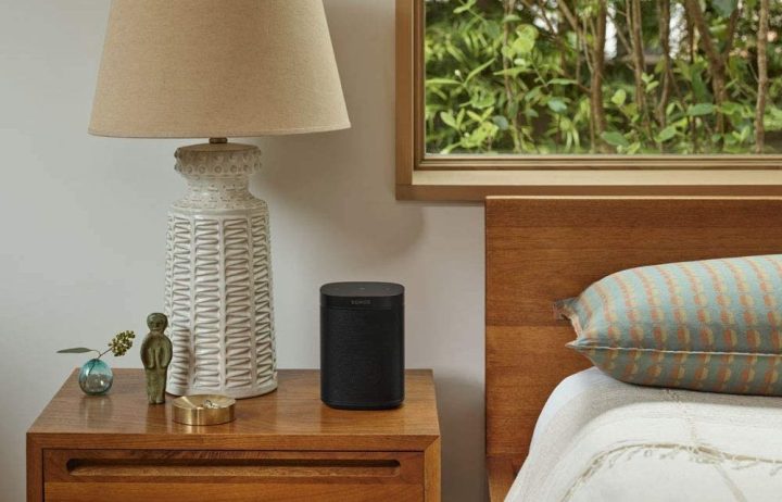 The Sonos One on a bedside table.