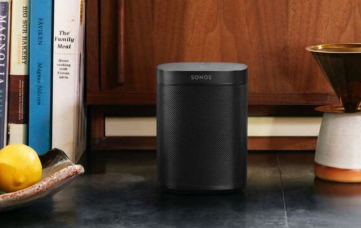 The Sonos One smart speaker on a countertop.