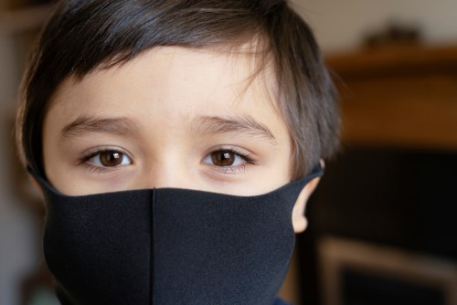 kid wearing face mask