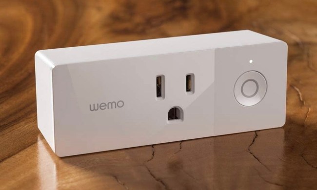 A Wemo Indoor smart plug on a table.