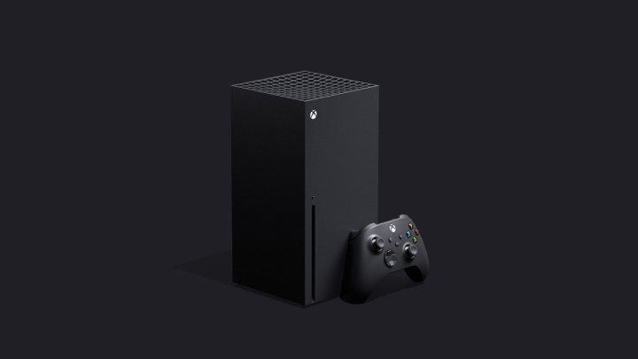 Matte black Xbox Series X and controller on a black background. 