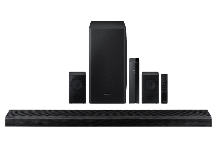 A row of speakers, a subwoofer and a soundbar.