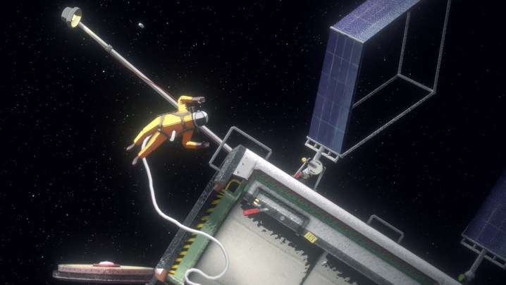 An astronaut holding onto a station.