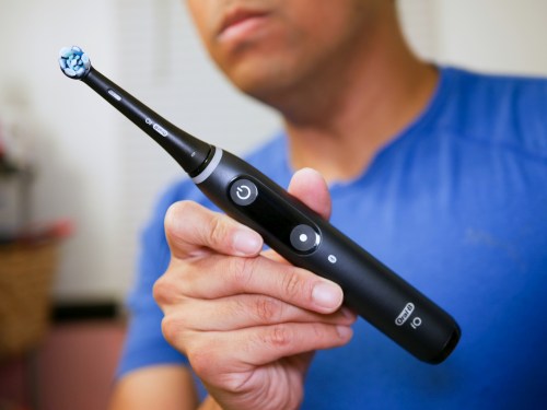 Oral-B iO Series 9 Smart Toothbrush held in hand