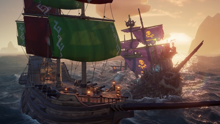 Two ships fighting in Sea of Thieves.