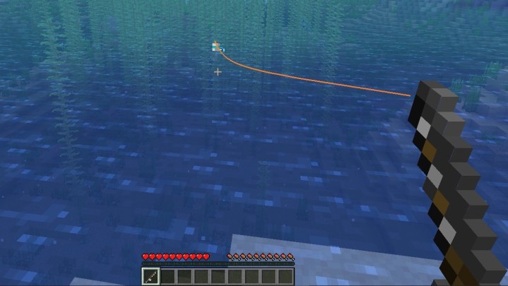 A player fishing in a lake.