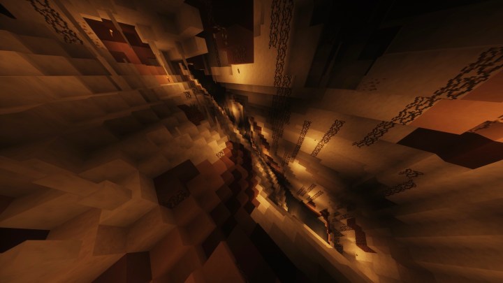 A deep and glowing chasm in Minecraft.