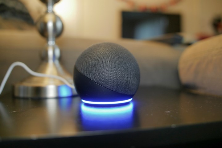 Amazon Echo Dot (4th-gen) on a table.