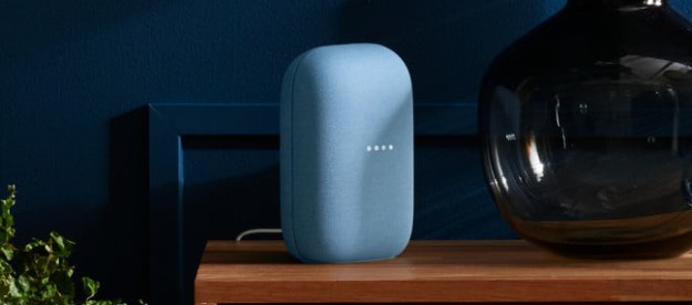 The Google Nest Audio speaker on a table.