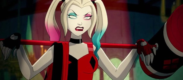 Harley Quinn holds a massive hammer while scowling.