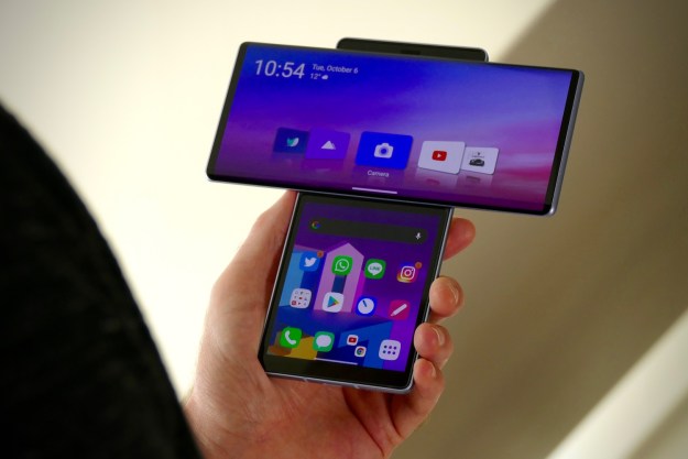 Someone holding the LG Wing, showing off both of its screens.