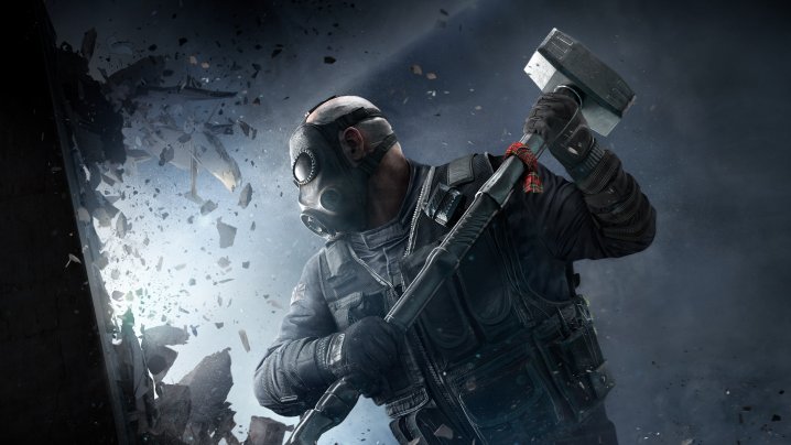 An operator bashes a wall in Rainbow Six Siege.