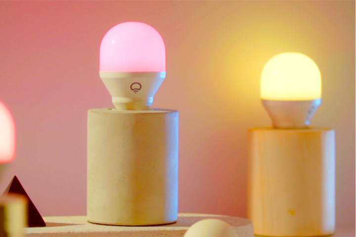 Group of LIFX colored bulbs in exposed bulb desk lamps